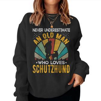 Never Underestimate An Old Woman Who Loves Schutzhund Women Sweatshirt - Thegiftio UK