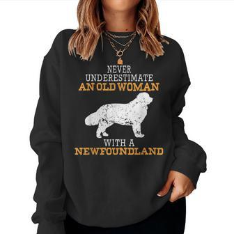 Never Underestimate An Old Woman With A Newfoundland Dog Women Sweatshirt - Monsterry DE