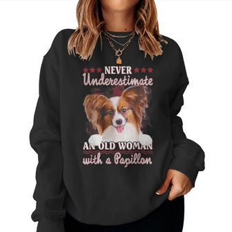 Never Underestimate An Old Woman With A Papillon Women Sweatshirt | Mazezy