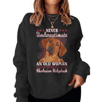 Never Underestimate An Old Woman With A Rhodesian Ridgeback Women Sweatshirt | Mazezy