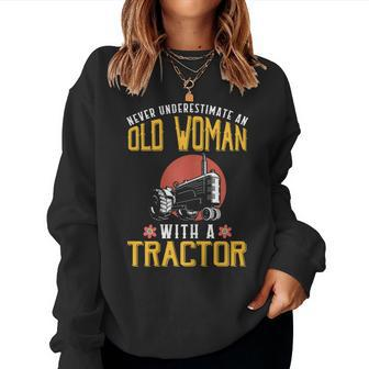 Never Underestimate An Old Woman With A Tractor Women Sweatshirt - Monsterry CA