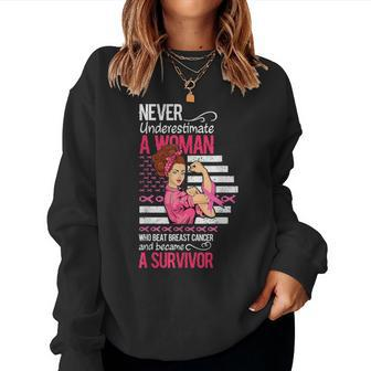 Never Underestimate A Woman Who Beat Breast Cancer Women Sweatshirt - Seseable