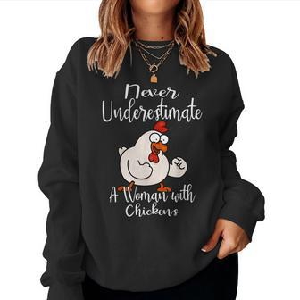 Never Underestimate A Woman With Chickens Farmer Chicken Women Sweatshirt - Monsterry DE