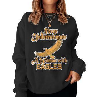 Never Underestimate A Woman With Eagles Bald Eagle Women Sweatshirt - Thegiftio UK