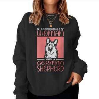 Never Underestimate A Woman With A German Shepherd Dog Women Sweatshirt - Thegiftio UK