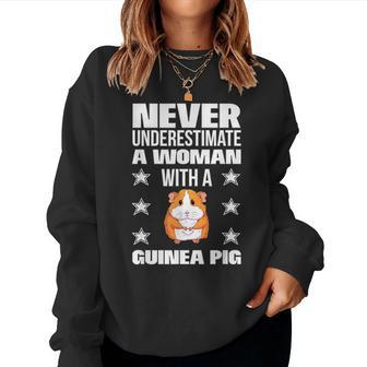Never Underestimate A Woman With A Guinea Pig Women Sweatshirt - Monsterry DE