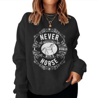 Never Underestimate A Woman With A Horse Riding Women Sweatshirt - Seseable