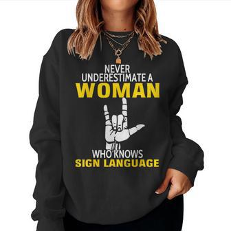 Never Underestimate A Woman Who Knows Sign Language Women Sweatshirt | Mazezy