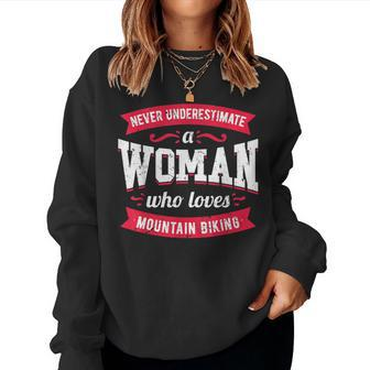 Never Underestimate A Woman Who Loves Mountain Biking Women Sweatshirt | Mazezy