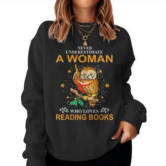 Never Underestimate A Woman Who Loves Reading Books Owl Women Sweatshirt - Seseable