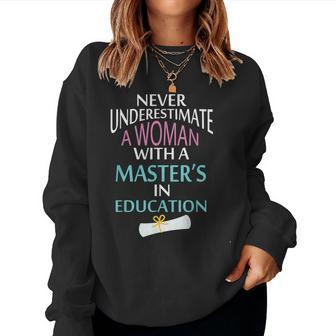 Never Underestimate A Woman With A Master's Women Sweatshirt - Monsterry