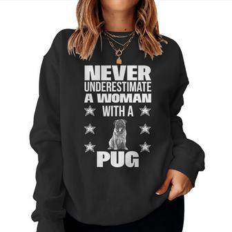 Never Underestimate A Woman With A Pug Women Sweatshirt - Monsterry AU