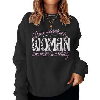 Never Underestimate A Woman Who Works In A Library Librarian Women Sweatshirt - Thegiftio UK