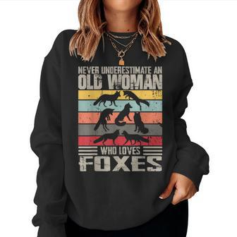 Vintage Never Underestimate An Old Woman Who Loves Foxes Women Sweatshirt | Mazezy