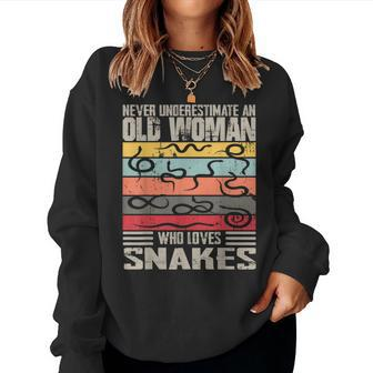 Vintage Never Underestimate An Old Woman Who Loves Snakes Women Sweatshirt | Mazezy