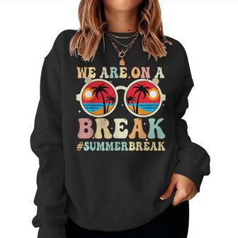 We Are On A Break Teacher Retro Groovy Summer Break Teachers Women Crewneck Graphic Sweatshirt - Seseable