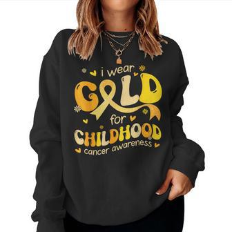 I Wear Gold Childhood Cancer Awareness Support Retro Groovy Women Sweatshirt | Mazezy
