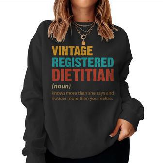 Womens Vintage Registered Dietitian Knows More Than She Says Funny Women Crewneck Graphic Sweatshirt - Thegiftio UK