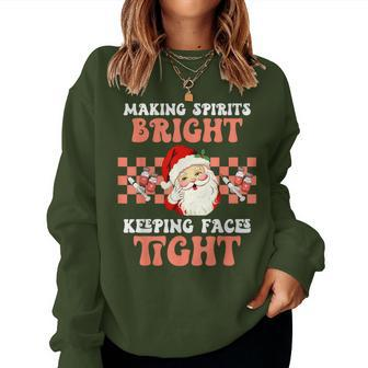 Making Spirits Bright Faces Tight Christmas Aesthetic Nurse Women Sweatshirt - Thegiftio UK