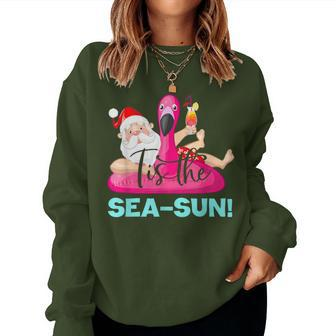 Santa Claus Flamingo Float Tis The Sea-Sun Christmas In July Women Sweatshirt - Monsterry DE