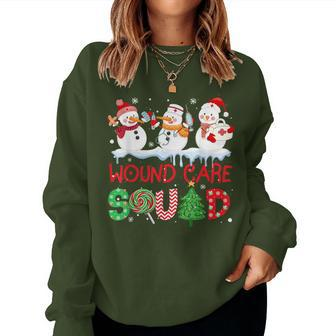 Snowman Wound Care Nurse Squad Christmas Holiday Matching Women Sweatshirt - Monsterry AU