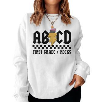 Abcd First Grade Rocks Back To School Teacher Lighting Bolt Women Sweatshirt - Seseable
