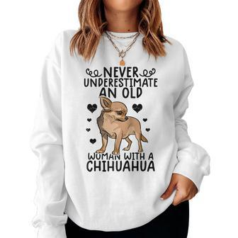 Chihuahua Womens Gifts Never Underestimate An Old Woman Women Crewneck Graphic Sweatshirt - Seseable