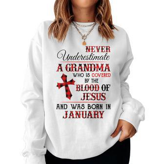 Covered By The Blood Of Jesus And Was Born In January Gift For Womens Women Crewneck Graphic Sweatshirt - Seseable