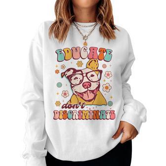 Educates Don't Discriminates Groovy Pitbull Lover Pittie Mom Women Sweatshirt - Seseable