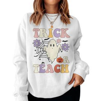 Groovy Teacher Halloween Trick Or Teach Retro Floral Ghost Women Sweatshirt | Mazezy