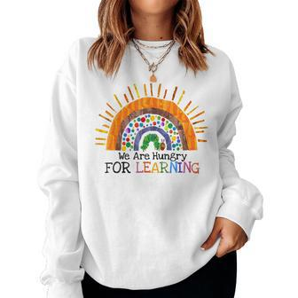 We Are Hungry For Learning Rainbow Caterpillar Teacher For Teacher Women Sweatshirt | Mazezy