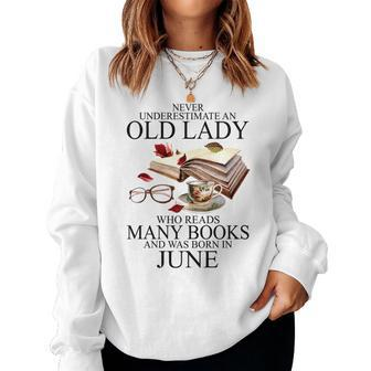 Never Underestimate An Old Lady Who Reads Many Books Women Crewneck Graphic Sweatshirt - Seseable