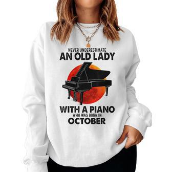 Never Underestimate An Old Lady With A Piano Born In October Women Crewneck Graphic Sweatshirt - Seseable