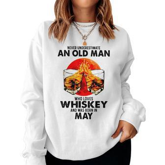 Never Underestimate An Old Man Who Loves Whiskey May Women Crewneck Graphic Sweatshirt - Seseable