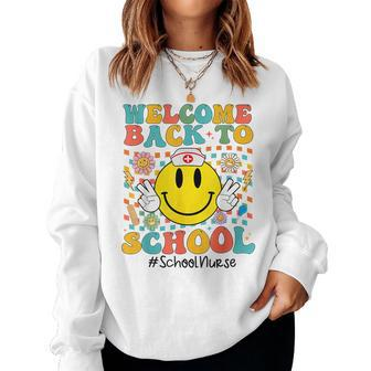 Retro Groovy Welcome Back To School Shool Nurse Smile Face Women Crewneck Graphic Sweatshirt - Seseable