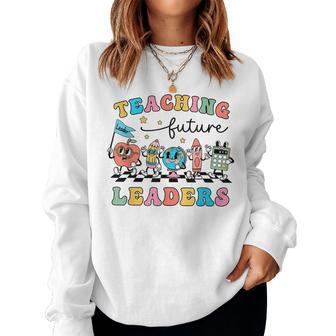 Retro Teaching Future Leaders Groovy Teacher Back To School Women Sweatshirt - Seseable