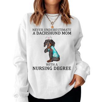 Never Underestimate A Dachshund Mom With A Nursing Degree Women Sweatshirt | Mazezy