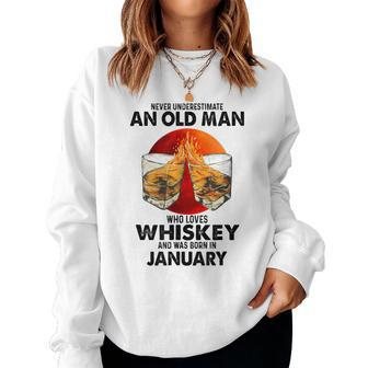 Never Underestimate An Old January Man Who Loves Whiskey Women Sweatshirt | Seseable UK