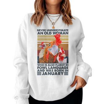 Never Underestimate Old Woman Fluent Fowl Born In January Women Sweatshirt - Seseable
