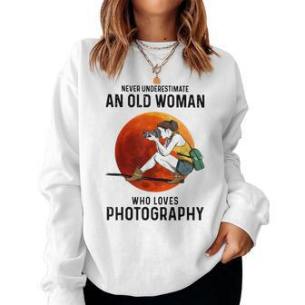 Never Underestimate An Old Woman Who Loves Photography Women Sweatshirt - Thegiftio UK