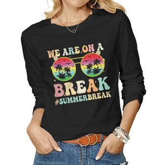 We Are On A Break Teacher Retro Groovy Summer Break Women Graphic Long Sleeve T-shirt - Thegiftio UK