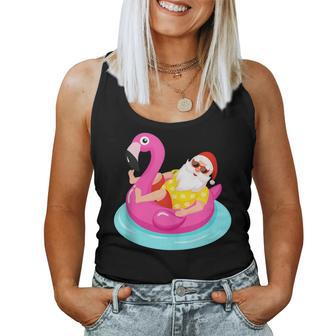 Christmas In July Santa Relaxing On A Flamingo Float Women Tank Top - Monsterry