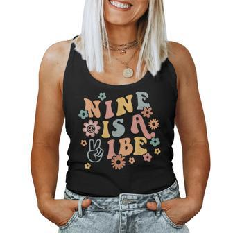 Groovy Hippie 9 Is A Vibe 9Th Birthday Party Decoration Women Tank Top Weekend Graphic - Monsterry UK