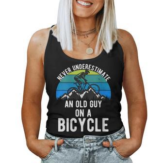 Never Underestimate An Old Guy On A Bike Mountain Mens Women Tank Top - Seseable