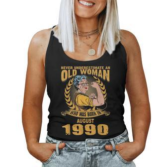 Never Underestimate Old Woman Born In August 1990 Women Tank Top | Mazezy