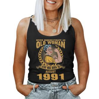 Never Underestimate Old Woman Born In August 1991 Women Tank Top | Mazezy