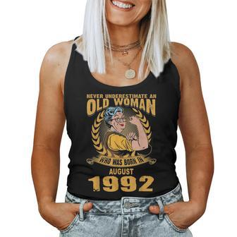 Never Underestimate Old Woman Born In August 1992 Women Tank Top | Mazezy