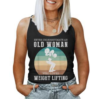 Never Underestimate An Old Woman Who Loves Lifting Women Tank Top - Thegiftio UK