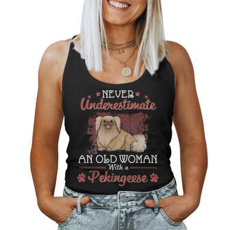 Never Underestimate An Old Woman With A Pekingese Dog Mother Old Woman Women Tank Top | Mazezy
