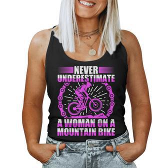 Never Underestimate A Woman On A Mountain Bike Women Tank Top - Monsterry